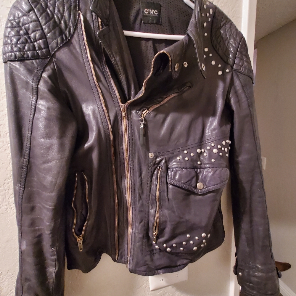 Awesome C.N.C black studded leather moto jacket.